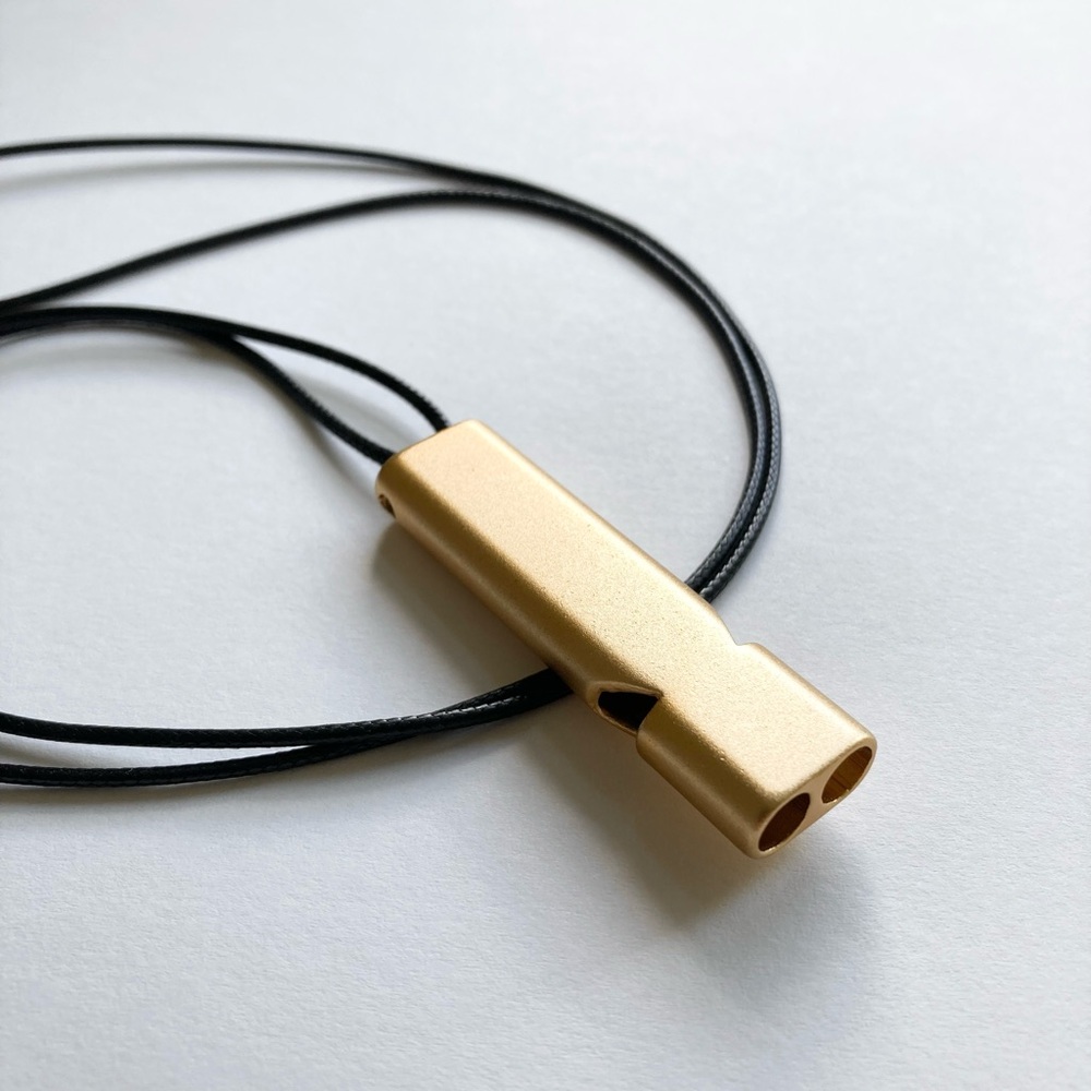 minimalist safety whistle necklace brass gold emergency alert self defense coach